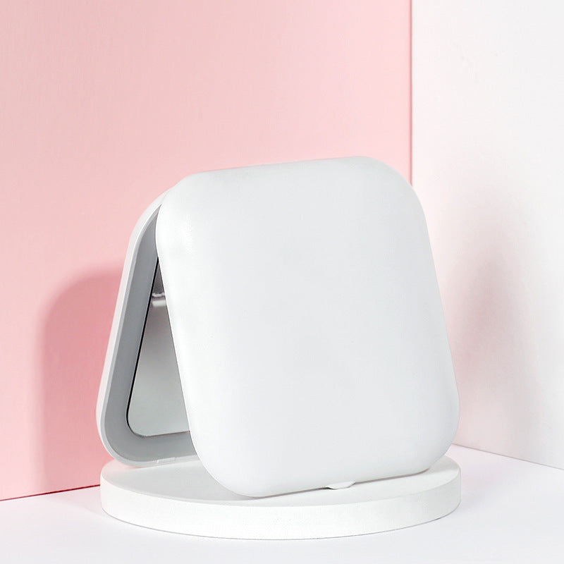 Espejo de maquillaje LED plegable portátil con luz